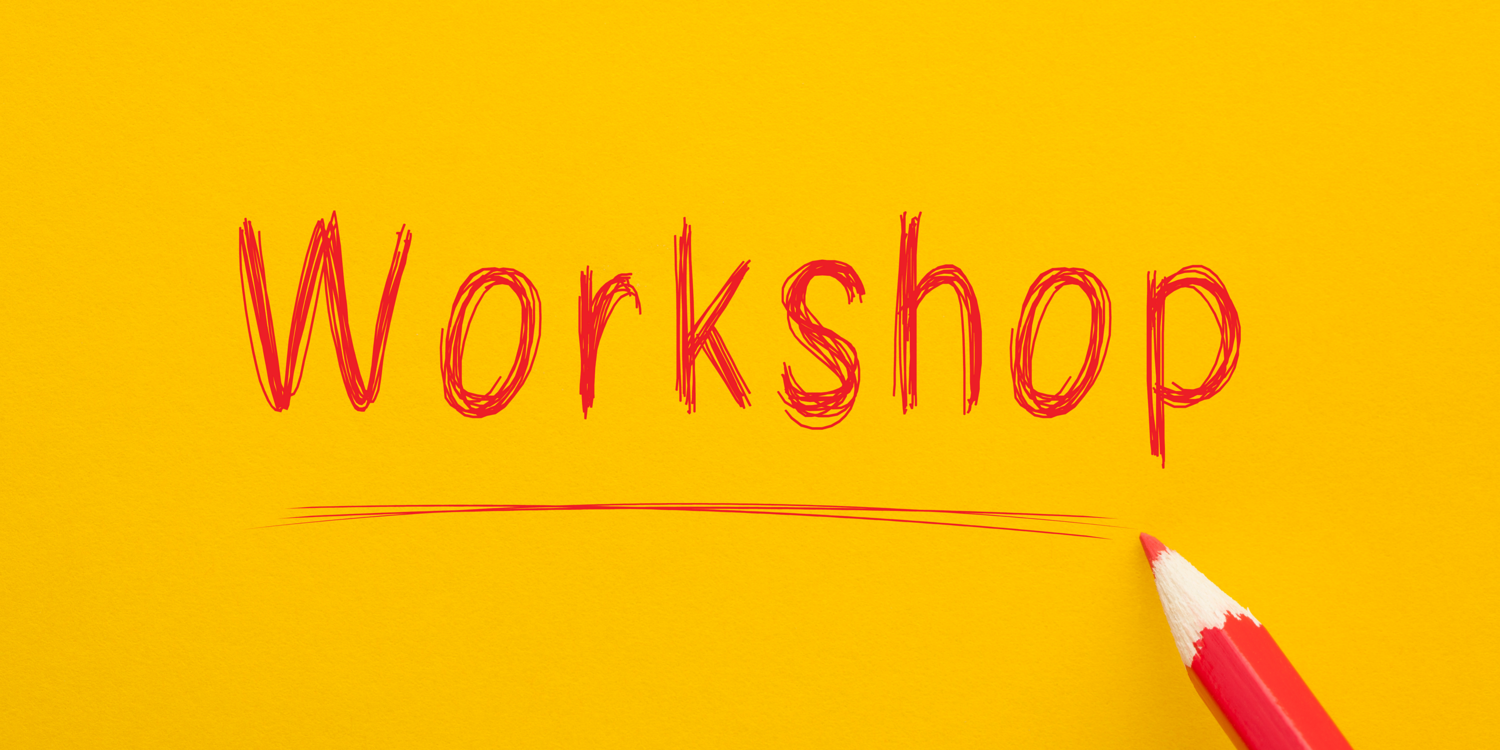 Mit einem roten Buntstift wurde das Wort 'Workshop' aufgeschrieben.